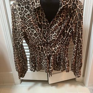 Ladies blouse animal print, very soft and comfortable worn once.